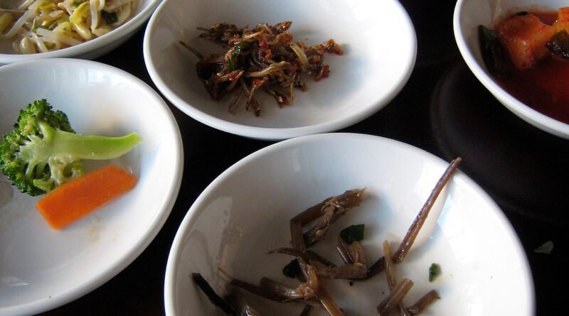 Korean banchan side dishes spread on a dining table
