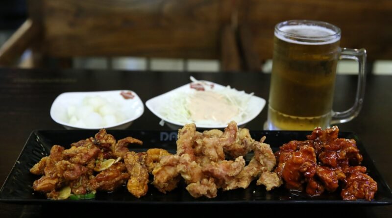 Korean fried chicken served with beer (chimaek)