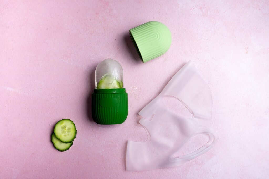 Green facial mask with cucumber slices