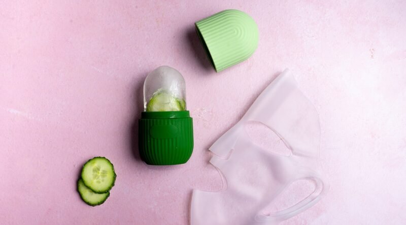 Green facial mask with cucumber slices